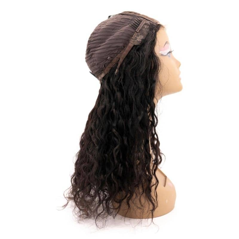 Side view of a messy curl transparent closure wig on a mannequin.