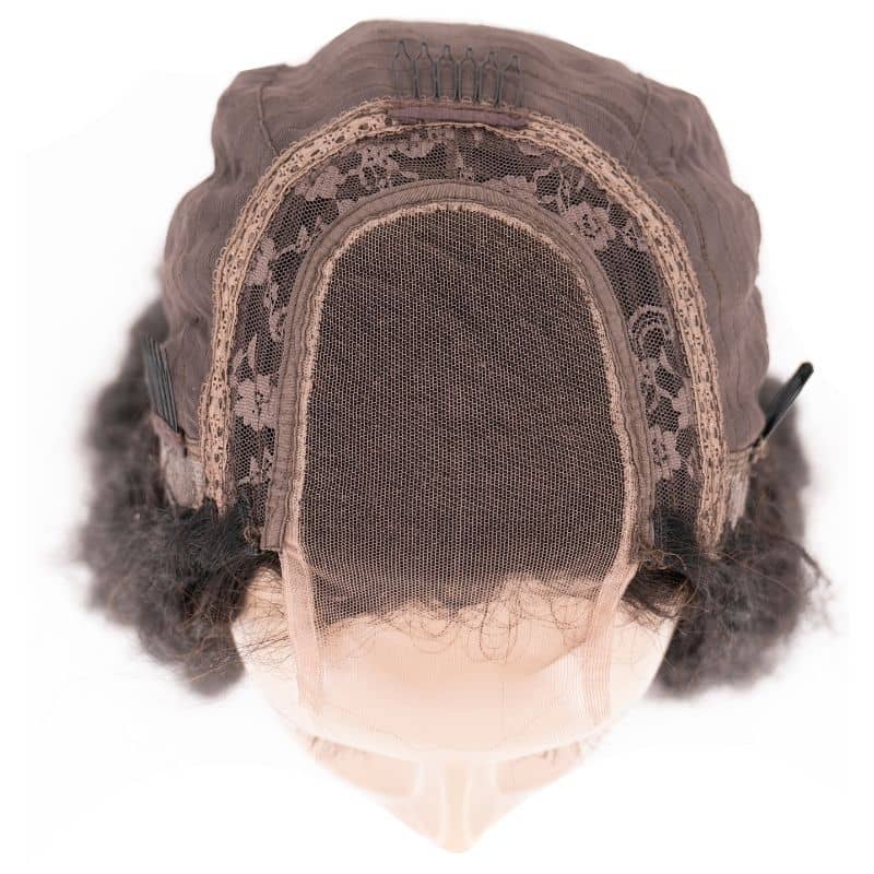 Top view of a kinky straight transparent closure wig on a mannequin head