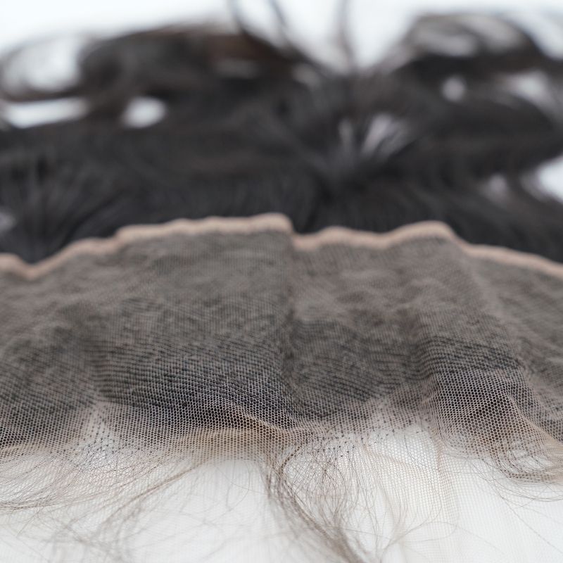 Malaysian Body Wave Lace Frontal showing the knots on the lace used for making unit