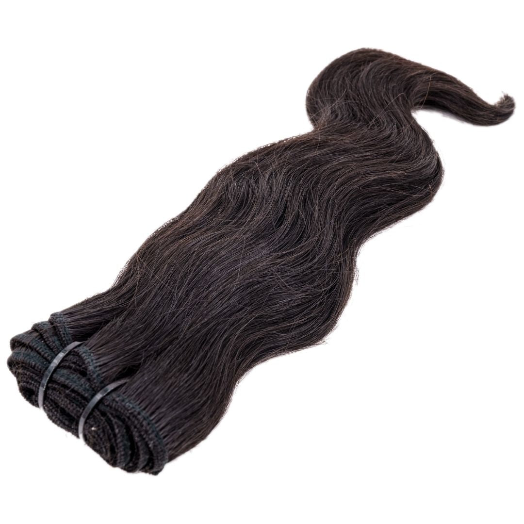 A bundle of Indian wavy hair extensions